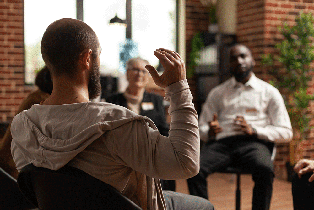 Group discussing addiction