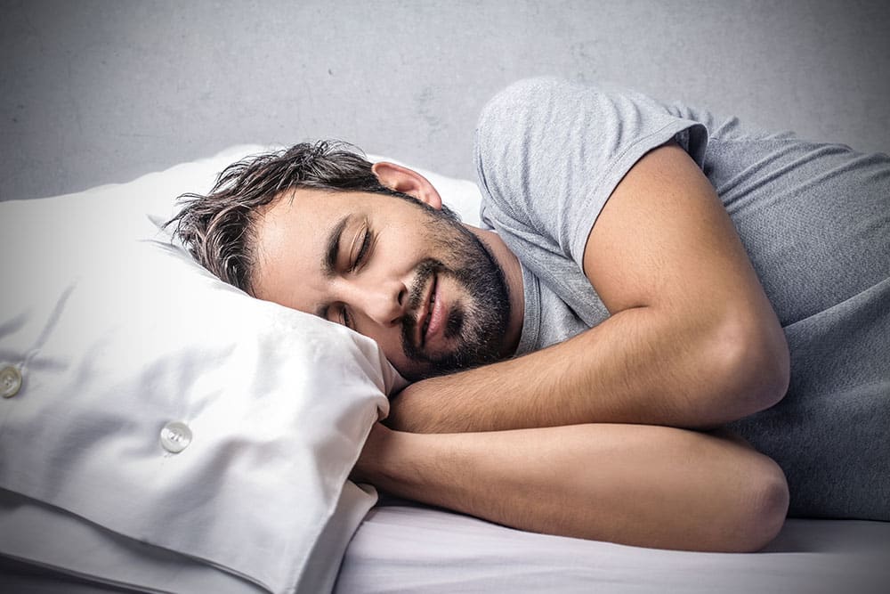 Person in bed sleeping well