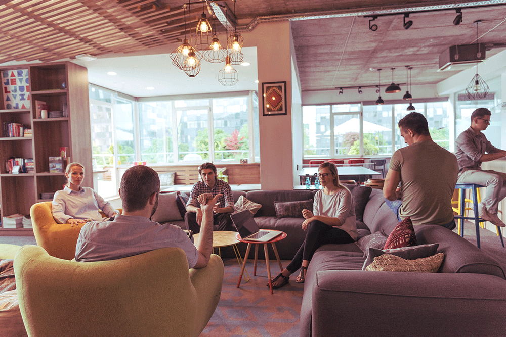 Cost-of-living Employee discussing cost of living in staff room