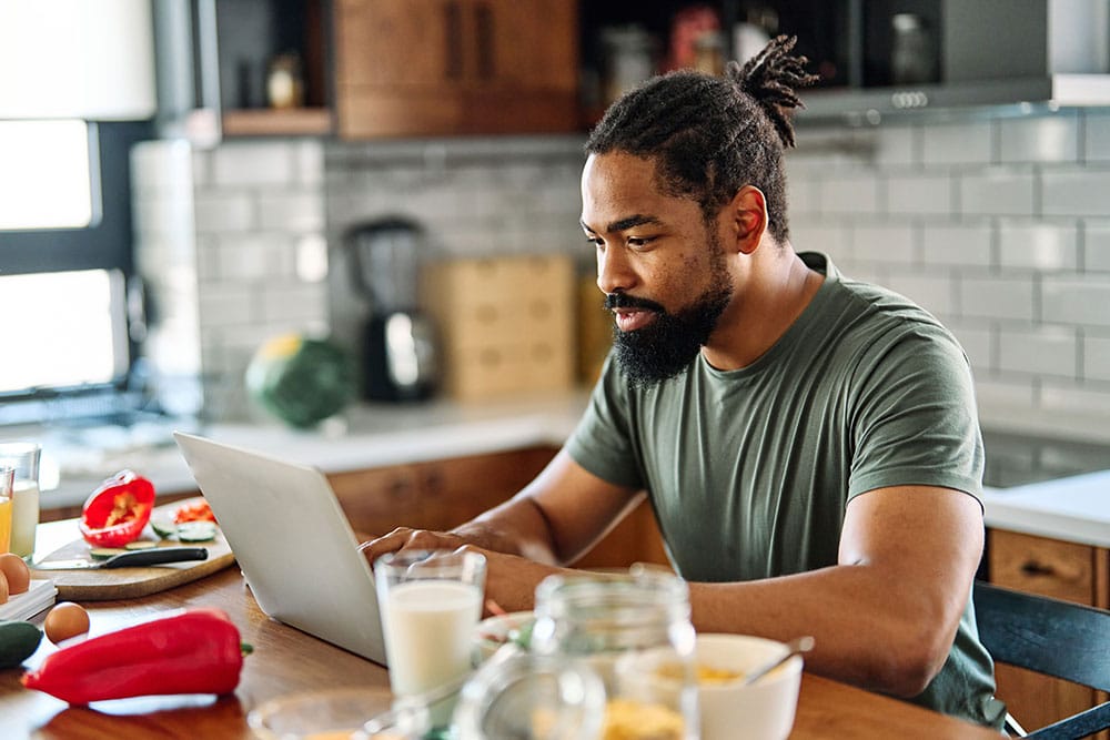 Strategies-for-healthy-eating-01.24 Man reading about three strategies to boost healthy eating