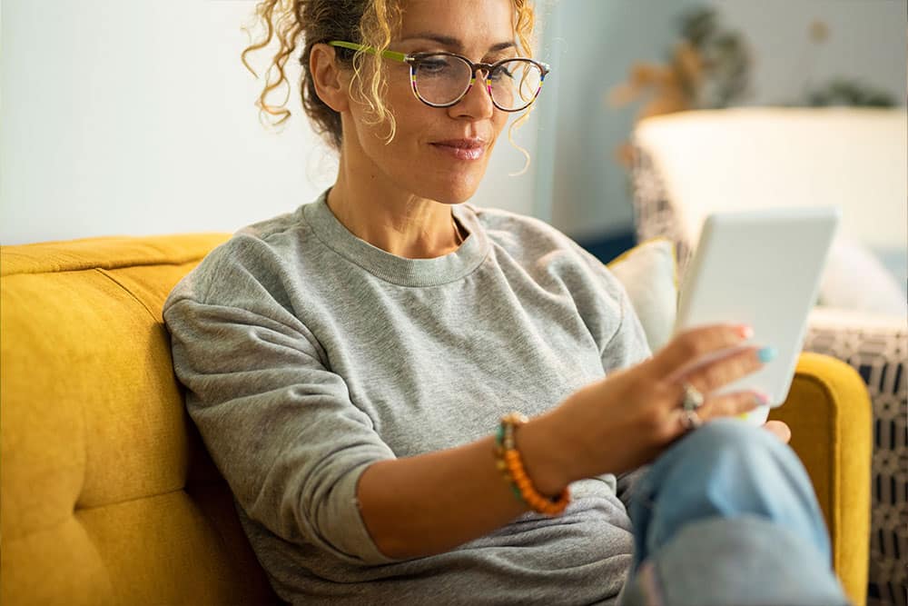 ADHD-and-women-02.24 Female reading about ADHD online