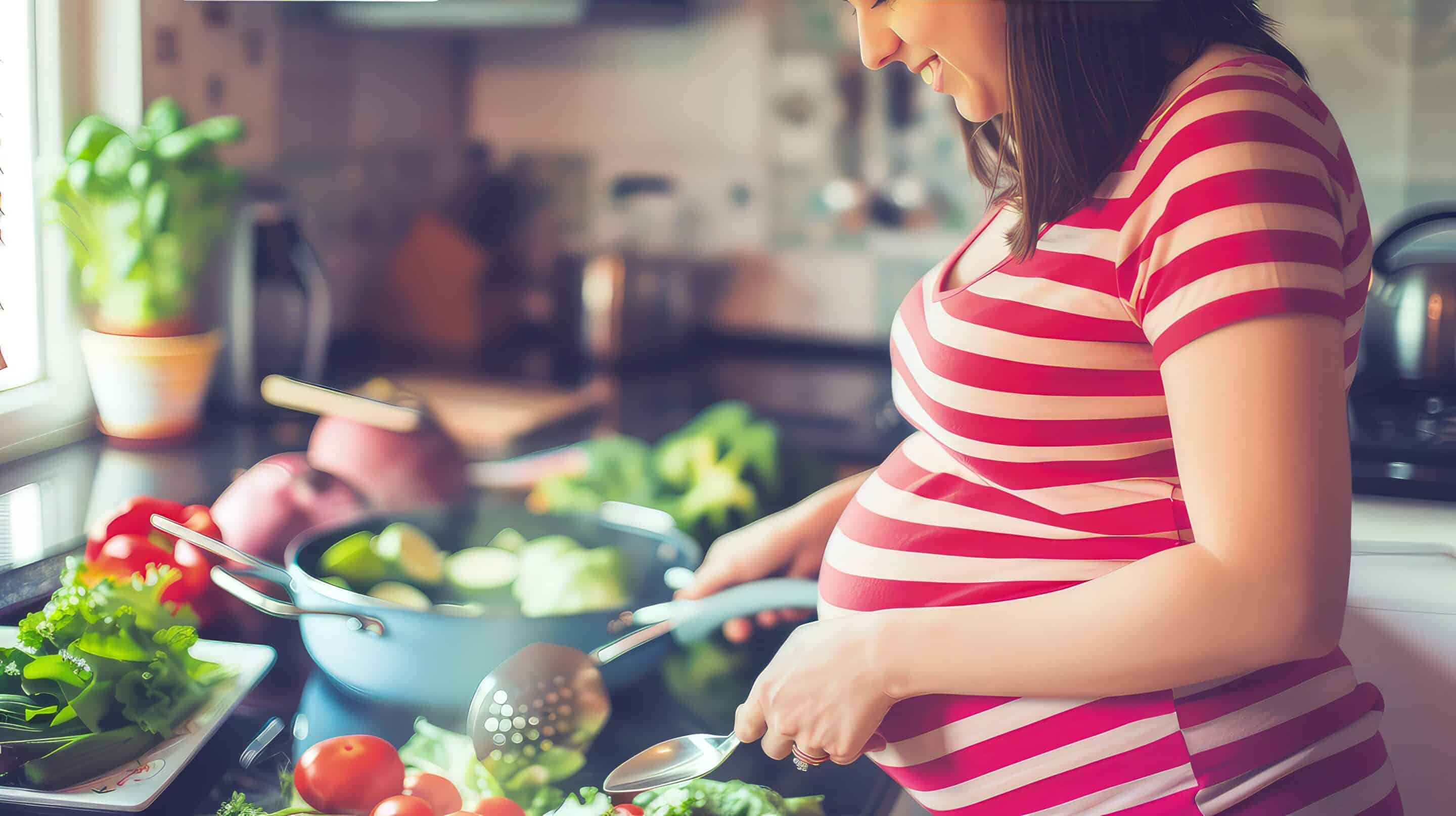 Pregnant woman cooking healthy food. Her maternal instinct infuses each dish with love and goodness. Pregnant woman cooking healthy food.