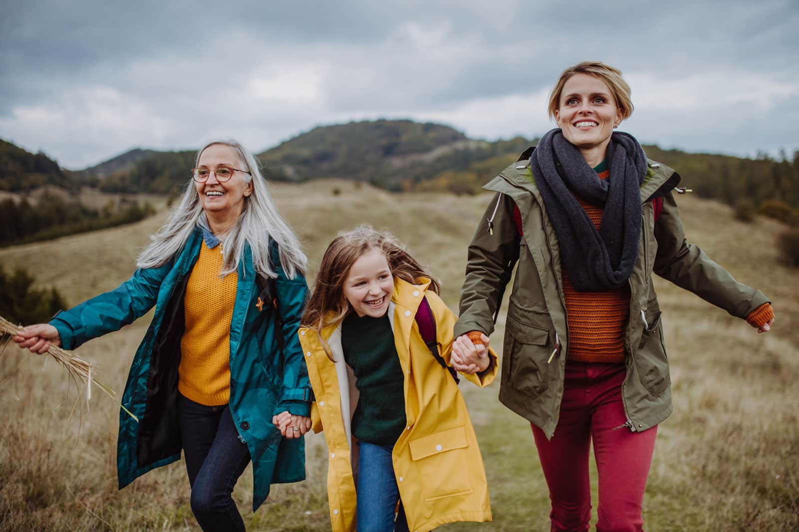 sandwich-generation An image showing three generations of females walking together, highlighting duel-caring responsibilities.